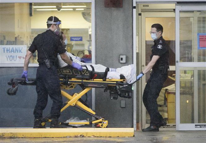 Dịch COVID-19: Mỹ ghi nhận hơn 200.000 ca mới trong một ngày ảnh 2