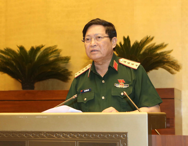 Đại tướng Ngô Xuân Lịch, Bộ trưởng Bộ Quốc phòng giải trình ý kiến của đại biểu Quốc hội. (Ảnh: Doãn Tấn/TTXVN) Xây dựng lực lượng dự bị động viên phù hợp với tình hình mới ảnh 1