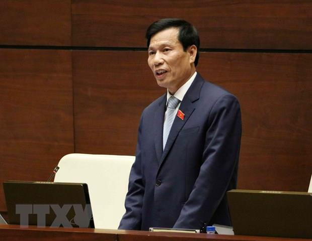 Bộ trưởng Bộ Văn hóa, Thể thao và Du lịch Nguyễn Ngọc Thiện trả lời chất vấn của đại biểu Quốc hội. (Ảnh: Văn Điệp/TTXVN) Kỳ họp thứ 7, Quốc hội khóa XIV: Biến cam kết thành hành động ảnh 3