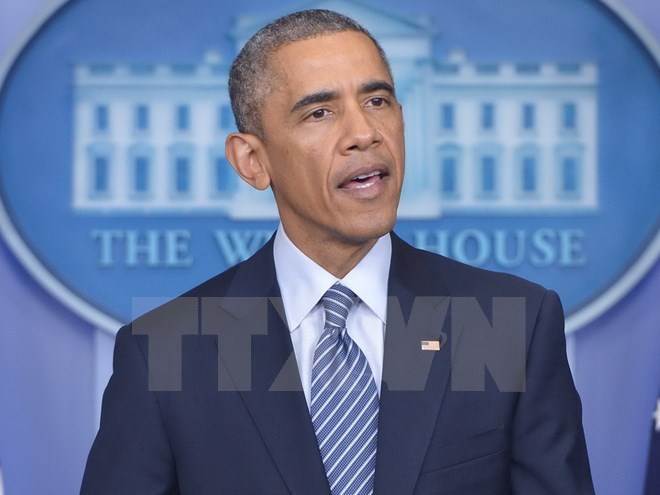 Tổng thống Mỹ Barack Obama. (Nguồn: AFP/TTXVN) Tổng thống Mỹ sẽ ký dự luật trừng phạt Nga trong tuần này ảnh 1