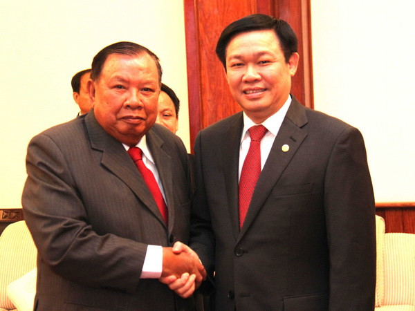 Việt-Lào chia sẻ kinh nghiệm về chiến lược phát triển kinh tế ảnh 1