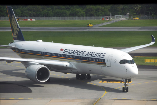 Máy bay của hãng hàng không Singapore Airlines tại sân bay Changi. (Ảnh: AFP/TTXVN) ttxvn-hang_khong_2.jpg