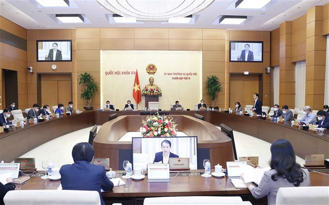 Quang cảnh phiên họp. (Ảnh: Doãn Tấn/TTXVN) Giám sát sắp xếp đơn vị hành chính cấp huyện, cấp xã từ 2019-2021 ảnh 1