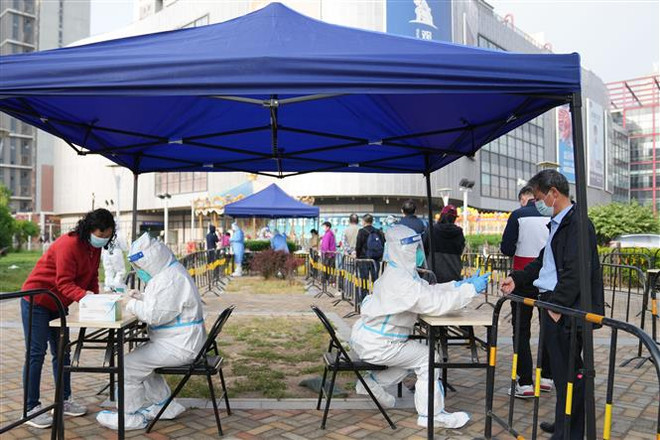 Trung Quốc: Bắc Kinh giảm thời gian cách ly với khách nhập cảnh ảnh 1