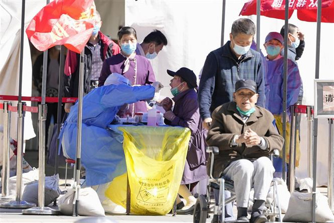 Thủ đô Bắc Kinh dỡ bỏ nhiều biện pháp hạn chế liên quan COVID-19 ảnh 1