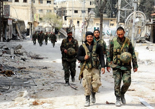 Binh sỹ quân đội Syria. (Nguồn: THX/TTXVN) Tổ chức cấm vũ khí hóa học tiếp tục nhiệm vụ điều tra ở Douma ảnh 1