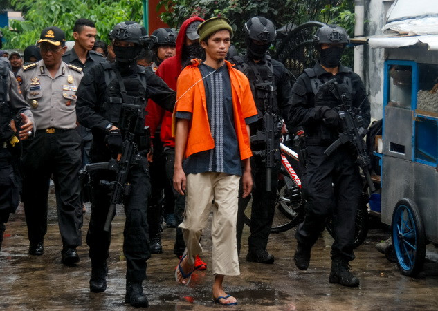 Cảnh sát Indonesia bắt giữ 18 đối tượng có quan hệ với phiến quân ảnh 1