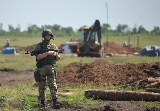 Vi phạm nhân quyền tiếp diễn ở Ukraine bất chấp lệnh ngừng bắn ảnh 1