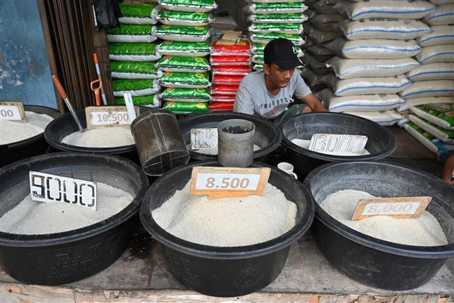 Ảnh minh họa. (Nguồn: AFP/TXTVN) Giá gạo Ấn Độ và Thái Lan tăng, giá càphê thế giới đồng loạt đi ngang ảnh 1