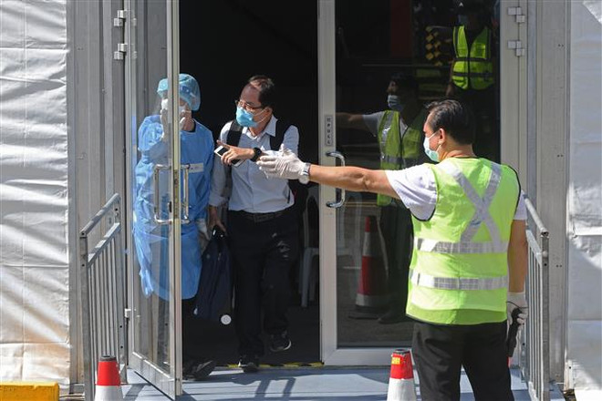 Singapore tăng cường biện pháp phòng chống biến thể Omicron ảnh 1