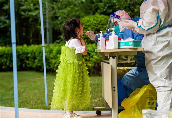 Trung Quốc yêu cầu hàng chục triệu dân không ra khỏi nhà do COVID-19 ảnh 1