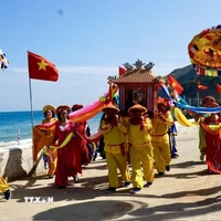 Một trong các nghi thức của Lễ hội. (Ảnh: Sỹ Thắng/TTXVN)