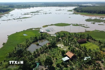 Đập thủy lợi Phước Hòa tại xã Nha Bích (Đồng Nai) có diện tích hơn 2.000ha với hồ Phước Hòa đã được quy hoạch là hồ cấp 1 quốc gia có tiềm năng phát triển các khu đô thị sinh thái ven hồ, khu sân golf kết hợp khu đô thị, dịch vụ du lịch, nghỉ dưỡng và các công viên tự nhiên. Đây sẽ là nơi hình thành không gian đô thị xanh với cảnh sắc thiên nhiên, thu hút du khách. (Ảnh: Đậu Tất Thành/TTXVN)
