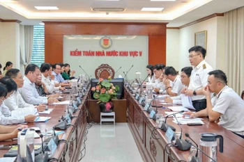 Quang cảnh buổi công bố quyết định kiểm toán. (Ảnh: Thanh Liêm/TTXVN)