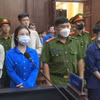 Các bị cáo tại Phiên tòa. (Ảnh: Khánh Ly/Vietnam+)