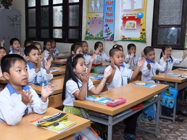 Hà Nội dự kiến cho học sinh lớp 1-6 tại 12 quận đến trường từ 21/2 ảnh 1
