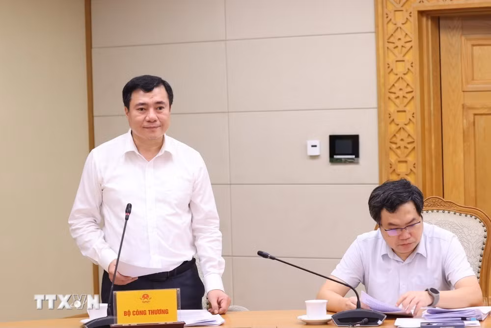 ttxvn-thu-truong-bo-cong-thuong-nguyen-sinh-nhat-tan-6537.jpg