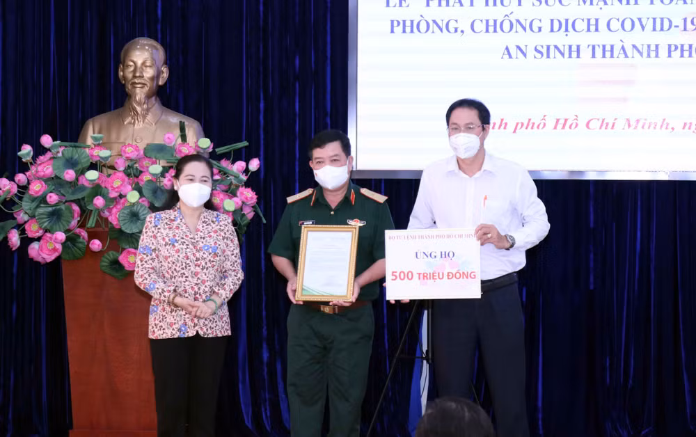 Thành phố Hồ Chí Minh: An dân trong cuộc chiến chống giặc COVID-19 ảnh 1