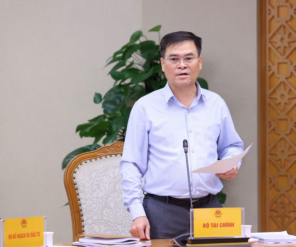 ttxvn_pho_thu_tuong_tran_hong_ha_chu_tri_cuoc_hop_quy_dinh_ve_gia_dat_2005-3.jpg