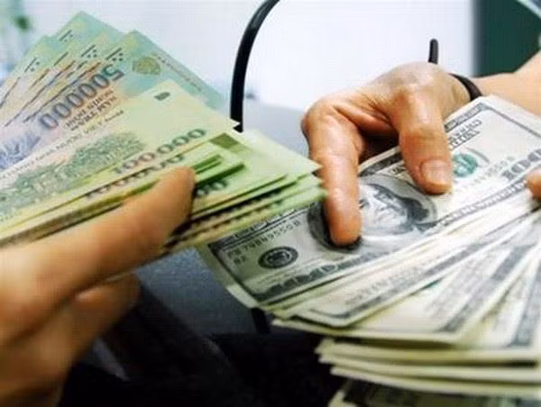 Ngân hàng Nhà nước công bố tỷ giá trung tâm giữa VND và USD ảnh 1