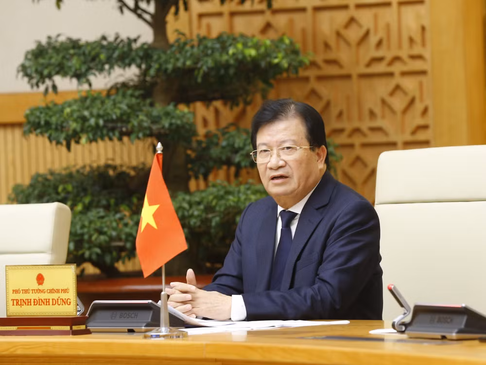 Phó Thủ tướng Trịnh Đình Dũng trả lời về việc xây dựng đường cao tốc ảnh 1