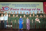 Các đại biểu dự chương trình "50 năm toàn thắng về ta." (Ảnh: Xuân Khu/TTXVN)