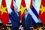 Thủ tướng Phạm Minh Chính hội kiến Bí thư thứ nhất, Chủ tịch Cuba Miguel Díaz-Canel Bermúdez. (Ảnh: Dương Giang/TTXVN)