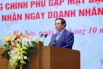 Thủ tướng Phạm Minh Chính phát biểu tại Hội nghị gặp mặt đại diện doanh nghiệp nhân Ngày doanh nhân Việt Nam. (Ảnh: Dương Giang/TTXVN)