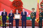Tổng Bí thư Tô Lâm trao Huân chương Lao động hạng Nhất cho Đảng bộ, chính quyền và nhân dân Thành phố Đà Nẵng. (Ảnh: Thống Nhất/TTXVN)