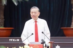 Tổng Bí thư Tô Lâm chúc Tết Đảng bộ, chính quyền và Nhân dân Thành phố Hồ Chí Minh. (Ảnh: Thống Nhất/TTXVN)