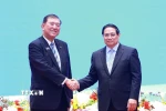 Thủ tướng Phạm Minh Chính và Thủ tướng Nhật Bản Ishiba Shigeru tại Diễn đàn doanh nghiệp Việt Nam-Nhật Bản. (Ảnh: Dương Giang/TTXVN)