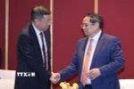 Thủ tướng Phạm Minh Chính tiếp ông Cát Hải Kiều, Chủ tịch Ngân hàng Trung Quốc (BOC). (Ảnh: Dương Giang/TTXVN)