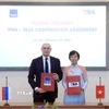 Lễ ký kết thỏa thuận hợp tác giữa TTXVN và Hãng thông tấn TASS (Liên bang Nga). (Ảnh: Tuấn Anh/TTXVN)