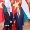 Chủ tịch Quốc hội Trần Thanh Mẫn đón Chủ tịch Quốc hội Hungary Kover Laszlo thăm chính thức Việt Nam. (Ảnh: Doãn Tấn/TTXVN)