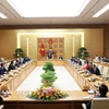 Thủ tướng Phạm Minh Chính tiếp đoàn lãnh đạo doanh nghiệp bán dẫn quốc tế. (Ảnh: Dương Giang/TTXVN)