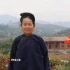 Bà Lường Thị Lan, dân tộc Nùng tại thôn Bắc Hoa, xã Tân Sơn hướng về Đại hội Đảng. (Ảnh: Thanh Thương/TTXVN)