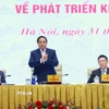 Thủ tướng Phạm Minh Chính và các Phó Thủ tướng tọa đàm với các doanh nghiệp về phát triển kinh tế tư nhân. (Ảnh: Dương Giang/TTXVN)