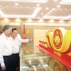 Tổng Bí thư Tô Lâm thăm Phòng truyền thống của Ban Tuyên giáo và Dân vận Trung ương. (Ảnh: Thống Nhất/TTXVN)