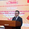 Nhà báo Lê Quốc Minh, Ủy viên Trung ương Đảng, Tổng Biên tập Báo Nhân Dân, Chủ tịch Hội Nhà báo Việt Nam phát biểu tại hội thảo. (Ảnh: Quốc Lũy/TTXVN)