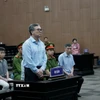Cựu Thứ trưởng Bộ Công Thương Hoàng Quốc Vượng tại phiên tòa. (Ảnh: Kim Anh/TTXVN)