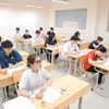 Thí sinh làm bài thi Tốt nghiệp Trung học phổ thông. (Ảnh: Minh Quyết/TTXVN)