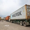 Hoạt động xuất nhập khẩu hàng hóa tại khu vực Cửa khẩu quốc tế Mộc Bài, tỉnh Tây Ninh. (Ảnh: Giang Phương/TTXVN)