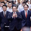 Thủ tướng Phạm Minh Chính đến dự Lễ công bố các nghị quyết, quyết định của Trung ương về sáp nhập đơn vị hành chính cho thành phố Hải Phòng. (Ảnh: Dương Giang/TTXVN)