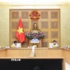 Thủ tướng Phạm Minh Chính kết luận buổi làm việc về tháo gỡ vướng mắc trong hoạt động hợp chuẩn hàng hóa. (Ảnh: Dương Giang/TTXVN)
