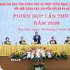 Thứ trưởng Bộ Công an Nguyễn Văn Long báo cáo kết quả triển khai Đề án 06. (Ảnh: Dương Giang/TTXVN)