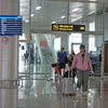 Hành khách tại nhà ga Sân bay Liên Khương. (Ảnh: Nguyễn Dũng/TTXVN)
