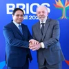 Thủ tướng Phạm Minh Chính và Tổng thống Cộng hòa Liên bang Brazil Lula da Silva. (Ảnh: Dương Giang/TTXVN)