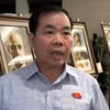 Đại biểu Nguyễn Quang Huân (đoàn Bình Dương) trả lời phỏng vấn. (Ảnh: Hải Ngọc/TTXVN)