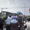 Ùn tắc giao thông kéo dài trên cầu Rạch Miễu. (Ảnh: Huỳnh Phúc Hậu/TTXVN)