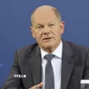 Thủ tướng Đức Olaf Scholz trong cuộc họp báo tại Berlin. (Ảnh: Kyodo/TTXVN)